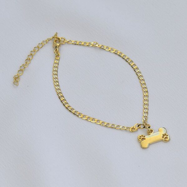 Pulseira Grumet Pequeno Pingente Osso com Patinha